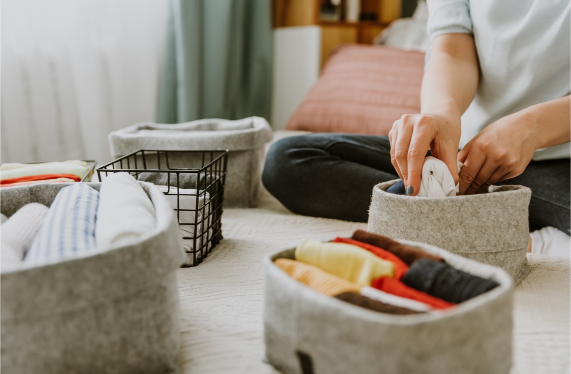 woman folding clothes