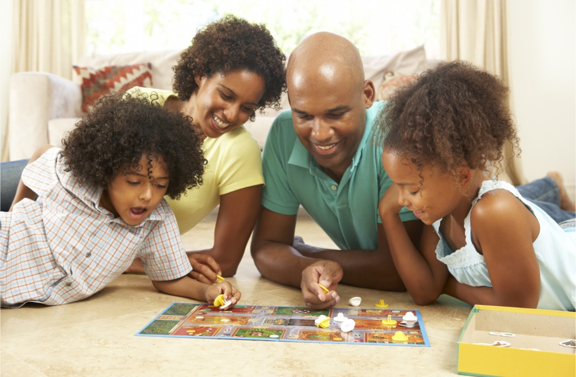 family playing board games