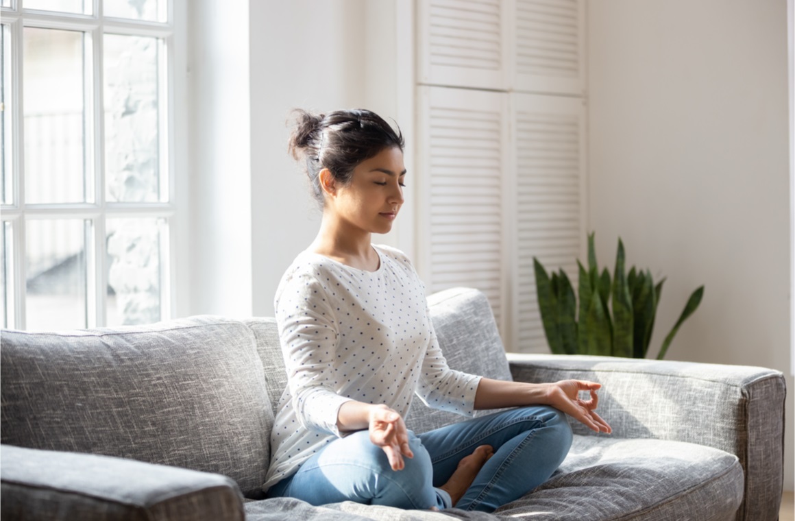 indian female meditation doing yoga