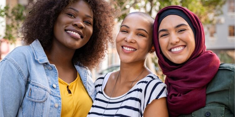 multiethnic friends looking at camera