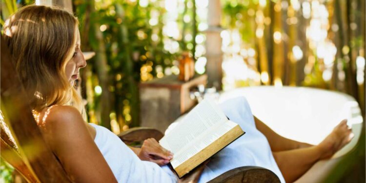 Attractive girl sitting in rocking chair