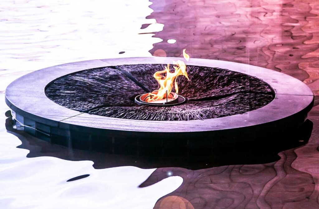 Flame burning in water feature