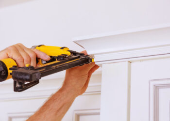 carpenter brad using nail gun