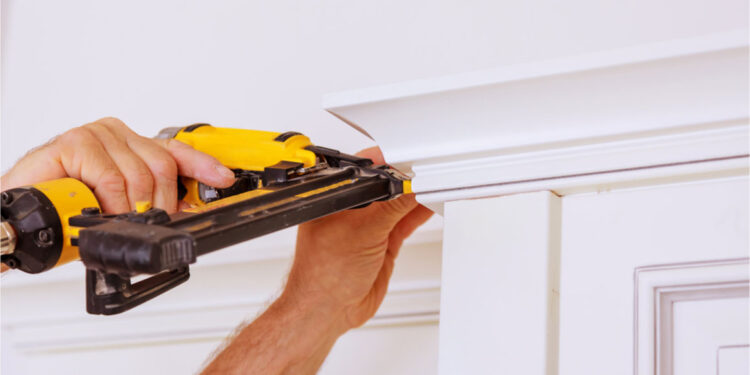 carpenter brad using nail gun