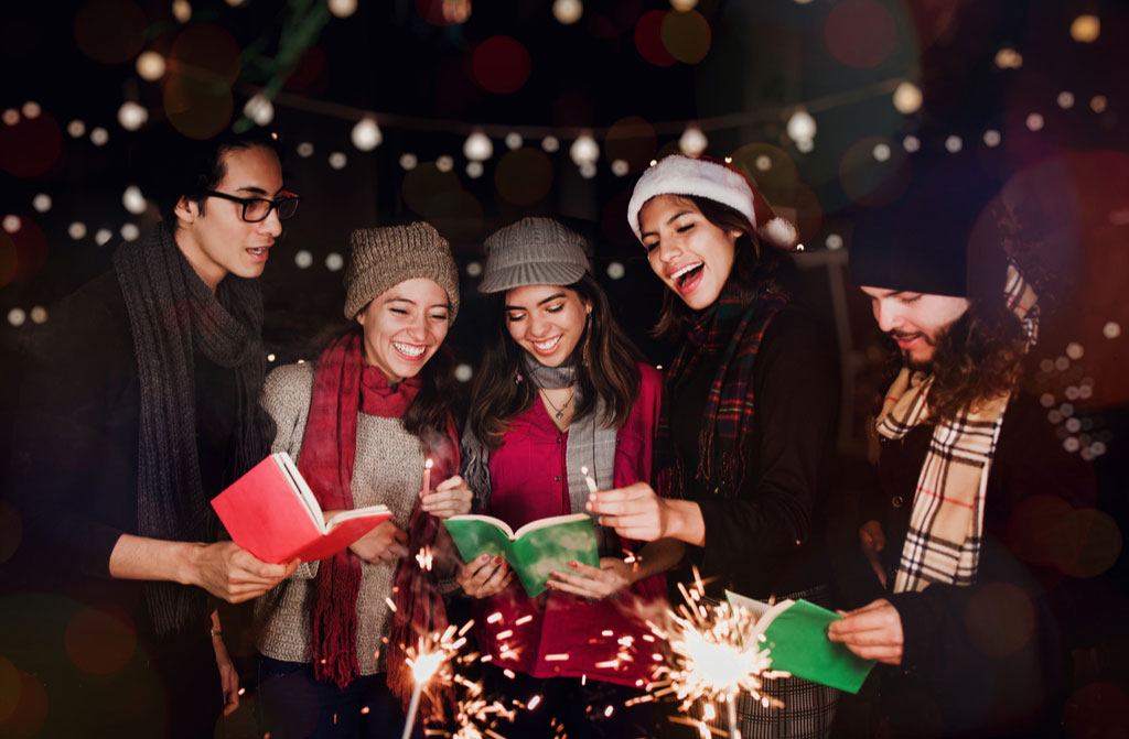 mexican american friends singing carols