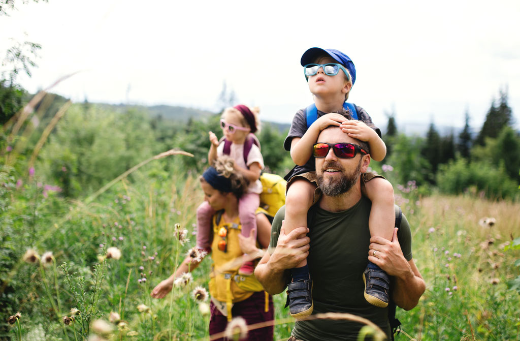 family small children hiking