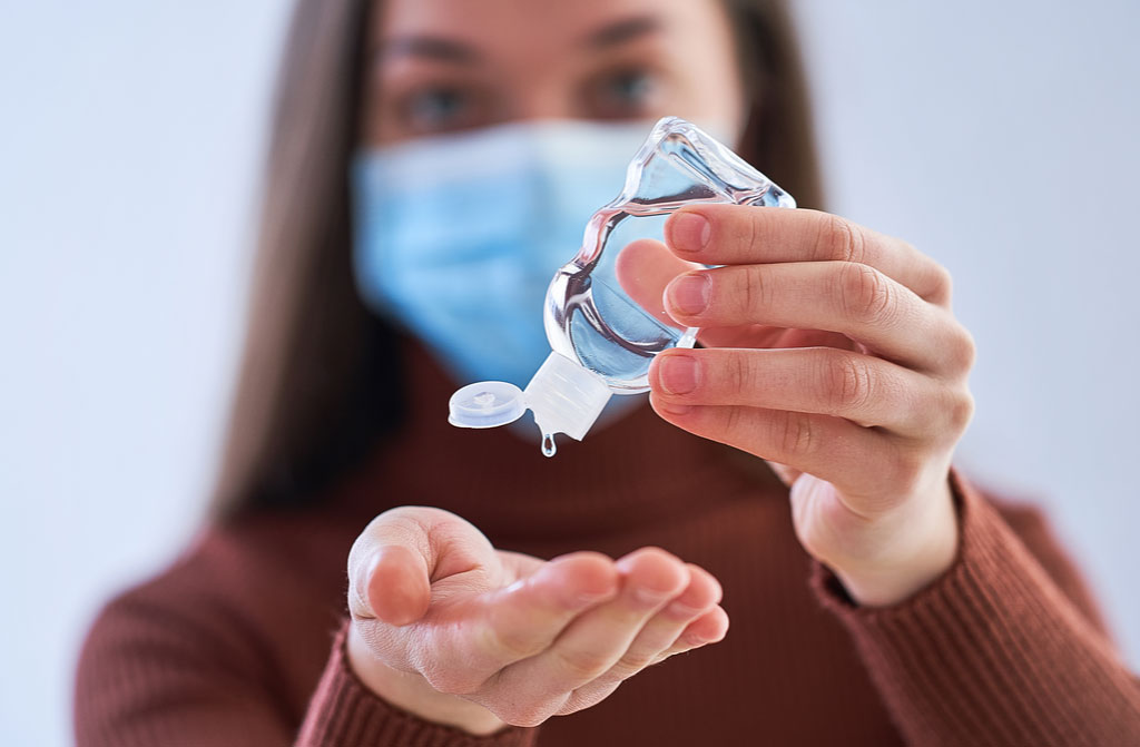 woman applying antibacterial