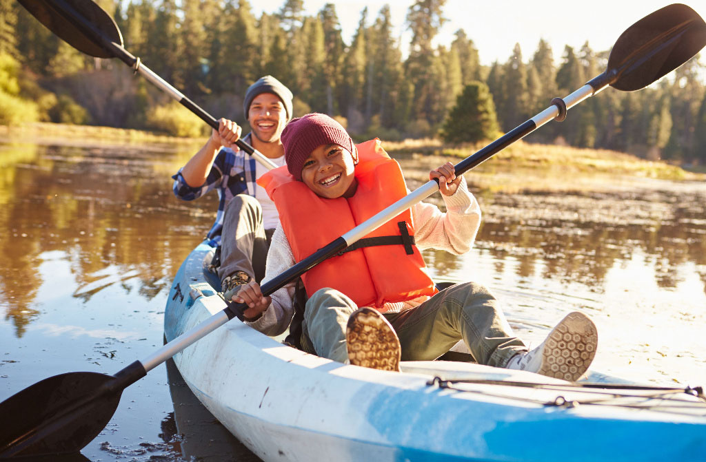 father and son kayak time