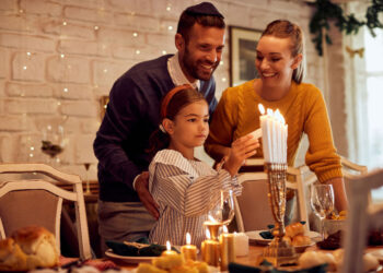 happy parents daughter lightnin candles