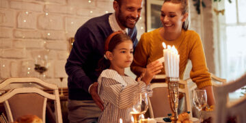 happy parents daughter lightnin candles