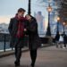 couple walking along south bank