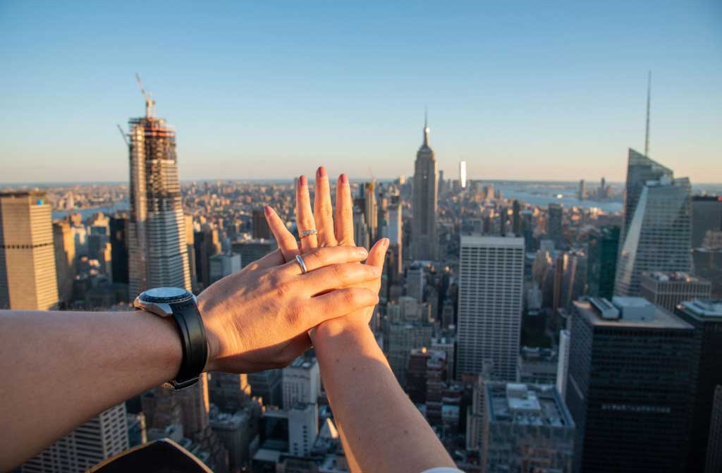 newly couple showing hands