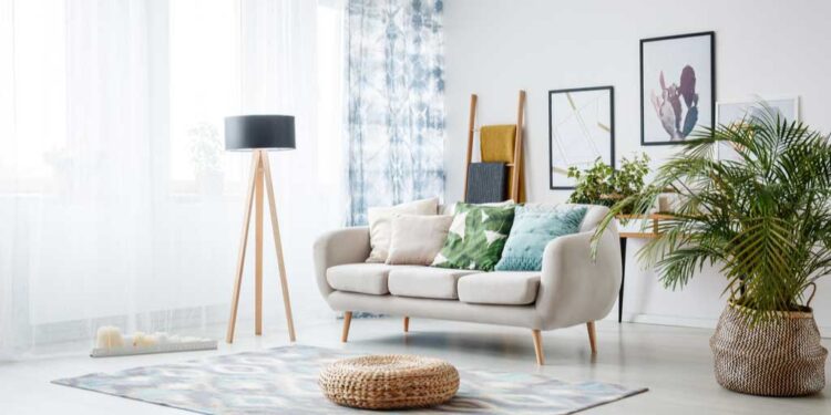 black lamp standing by sofa