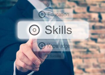 businessman pressing skills concept button