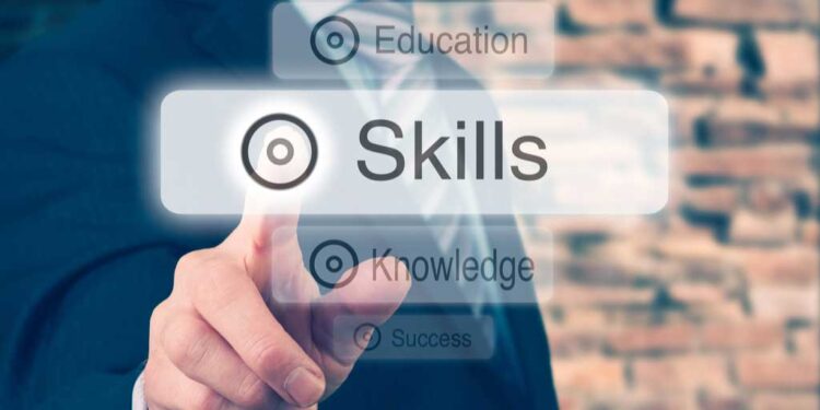 businessman pressing skills concept button