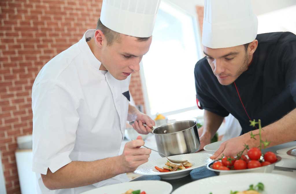 chef young preparing dishes