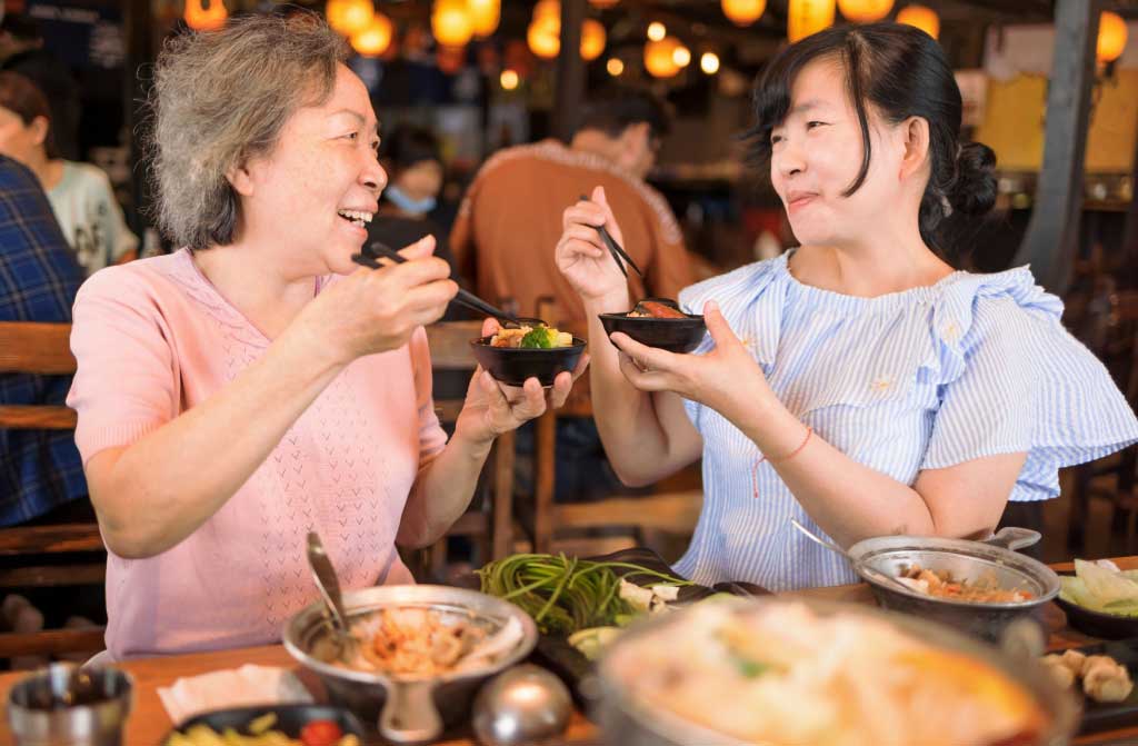 happy mother daughter celebrating