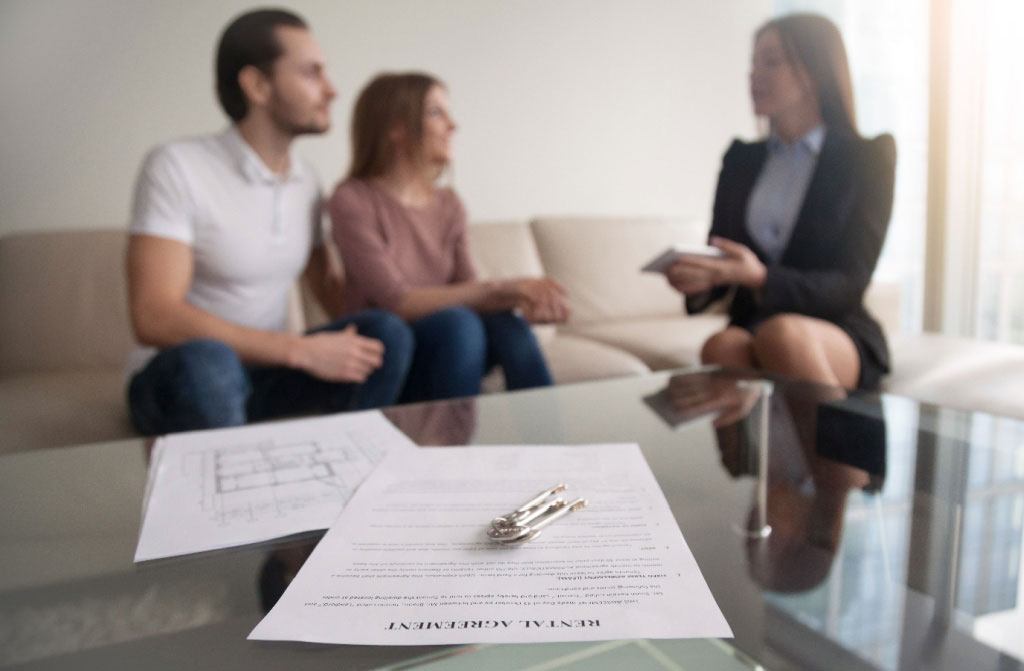 renter couple siting on couch