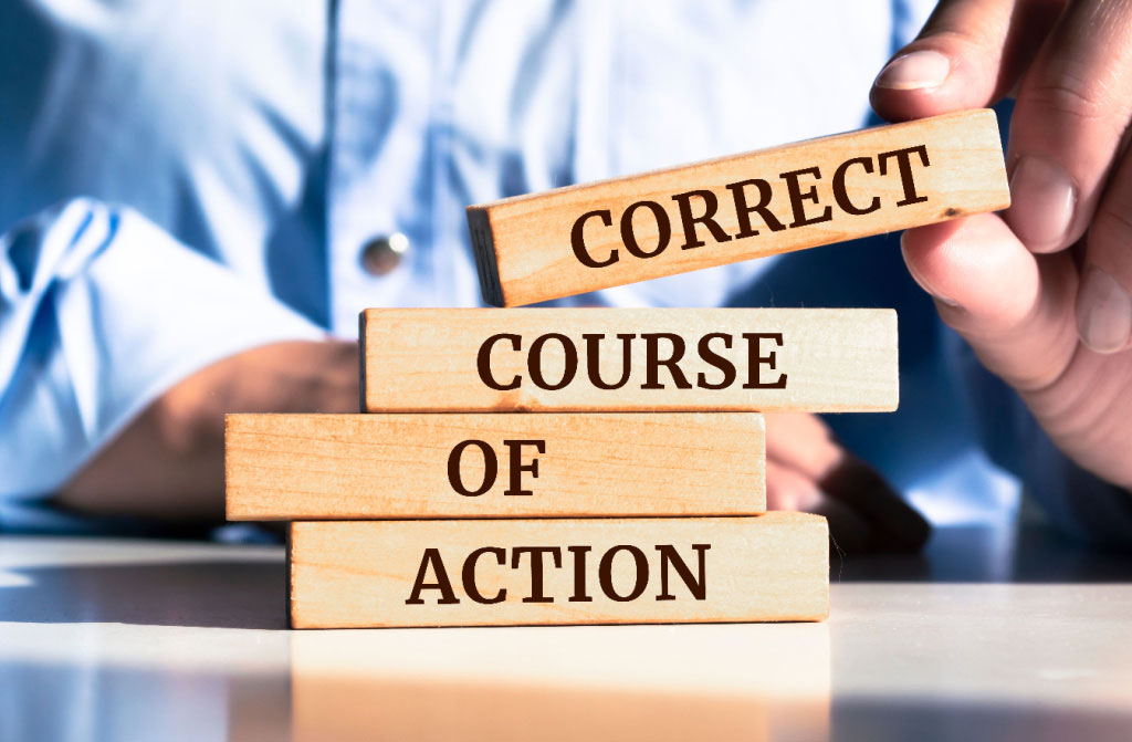 closeup businessman holding wooden words