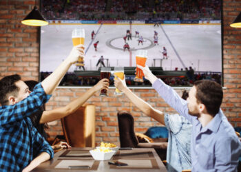 group young men cheering on