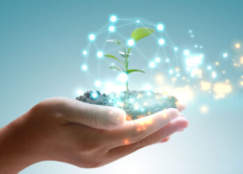 holding globe green plant growing