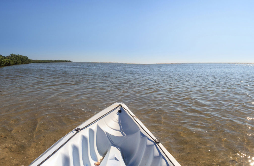 kayak through water