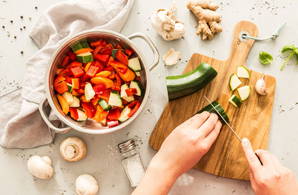 cooking chef hands preparing vegetables