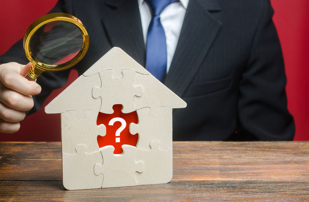 man examining house wooden