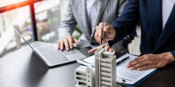 view of a residential and commercial buildings