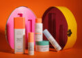 drunk elephant products on orange background