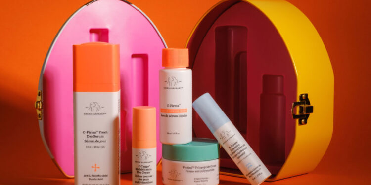 drunk elephant products on orange background