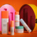 drunk elephant products on orange background
