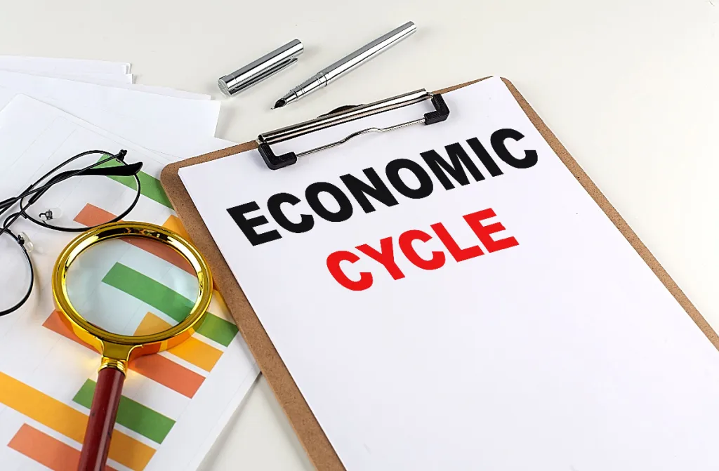economic cycle written on white paper