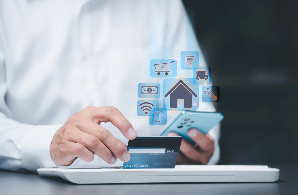 young businessman using credit card