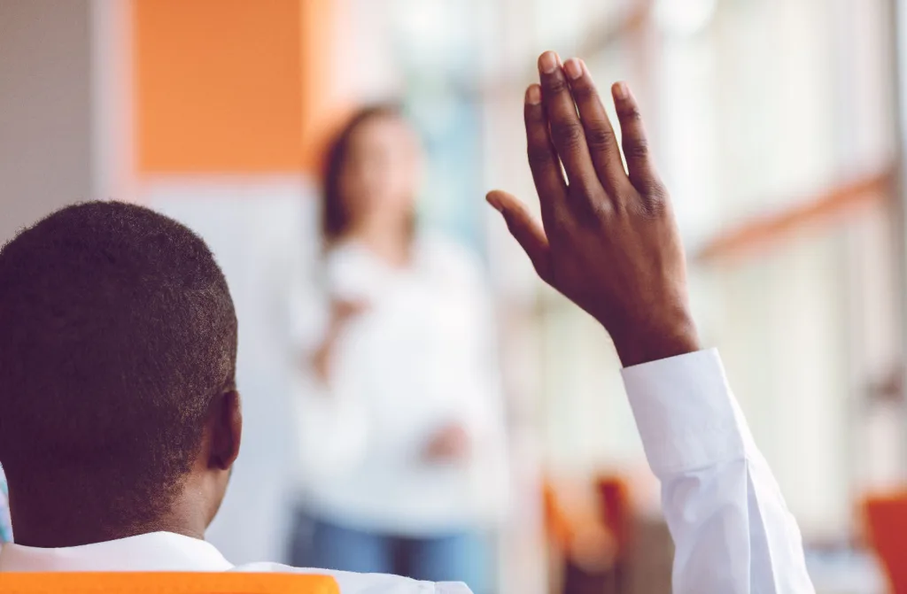 african american business people raising hand