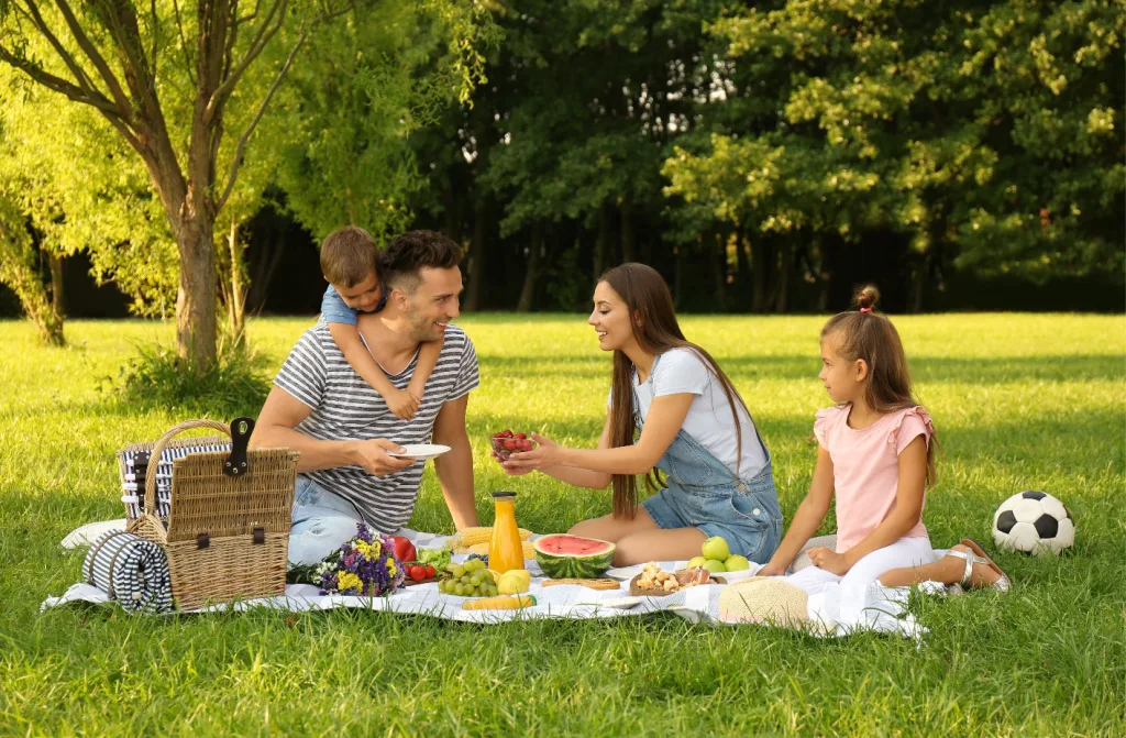 happy family having picnic