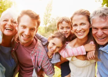 multigeneration family having fun together outdoors