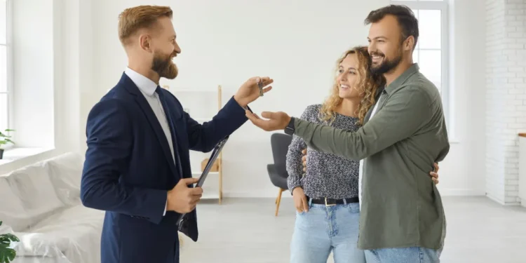 professional realtor standing empty living