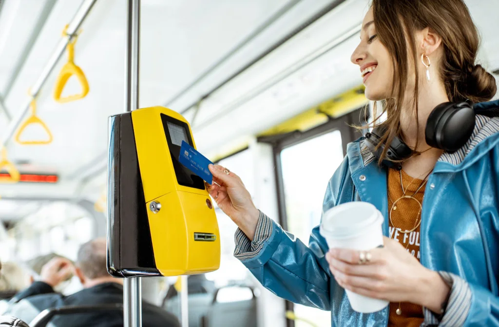 woman paying contactless with the card