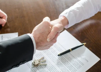 estate agents shaking hands